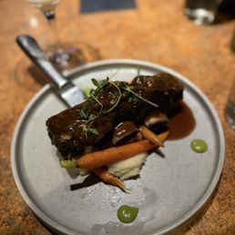 The Rabbit Hole signature dishes Cherry Braised Buffalo Short Ribs
Bacon Wrapped Rabbit Meat Loaf
Laughing Lab Braised Colorado Lamb Shanks